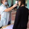 В новых условиях. Выпускники сдают ЕГЭ